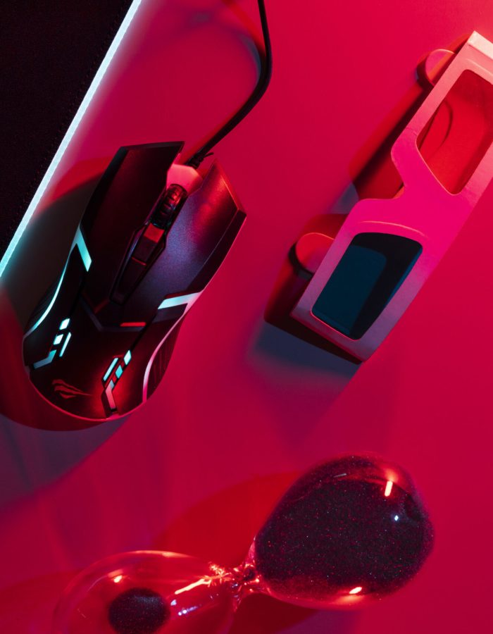 view-illuminated-neon-gaming-desk-setup-with-3d-glasses-scaled.jpg